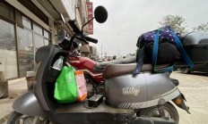 女子骑电动自行车近2个月从上海回广西引百万人围观：3000多公里路程 一天充3次电